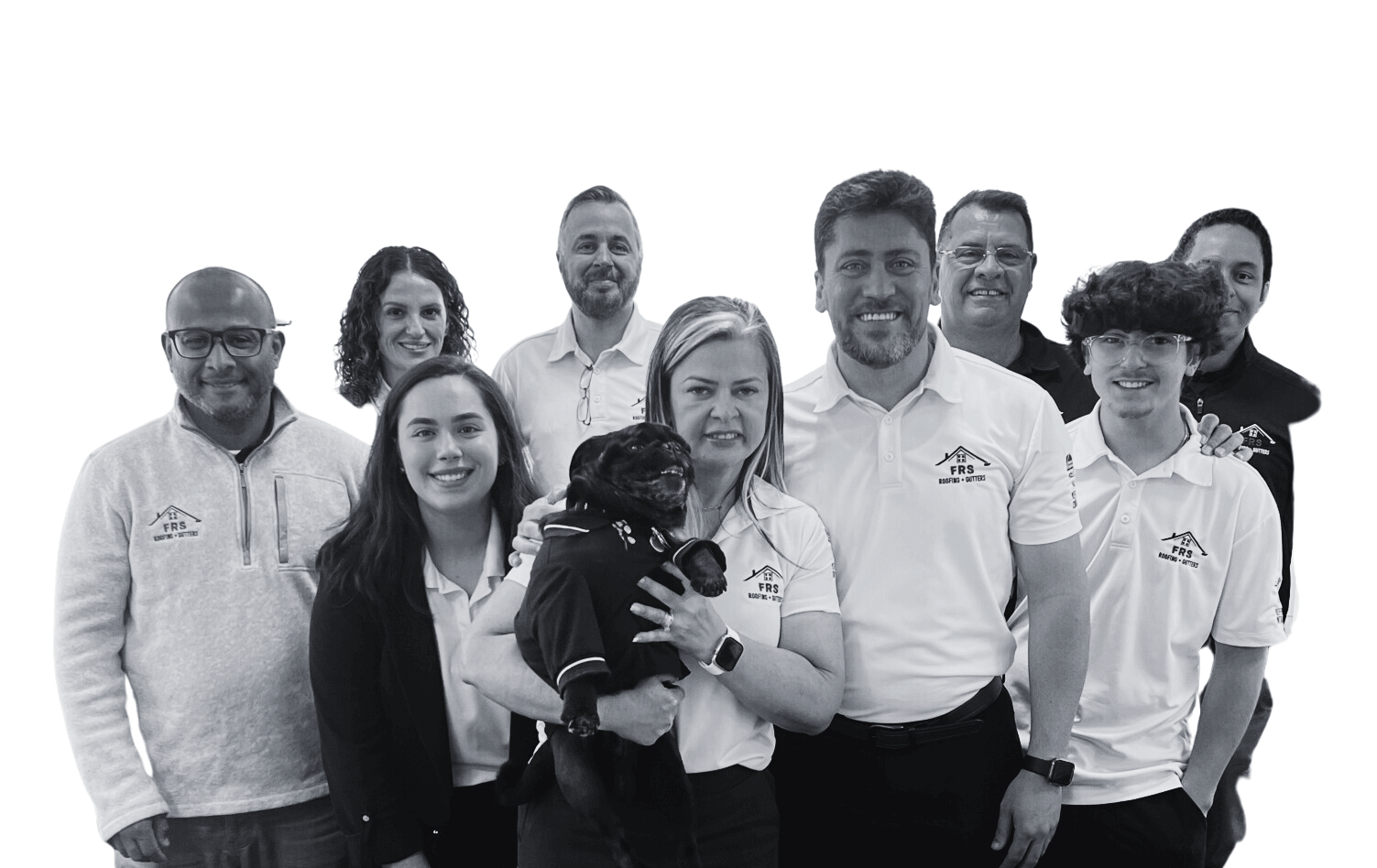 Smiling FRS Roofing & Gutters team posing together with their adorable black pug mascot, showing strong team spirit and professionalism.
